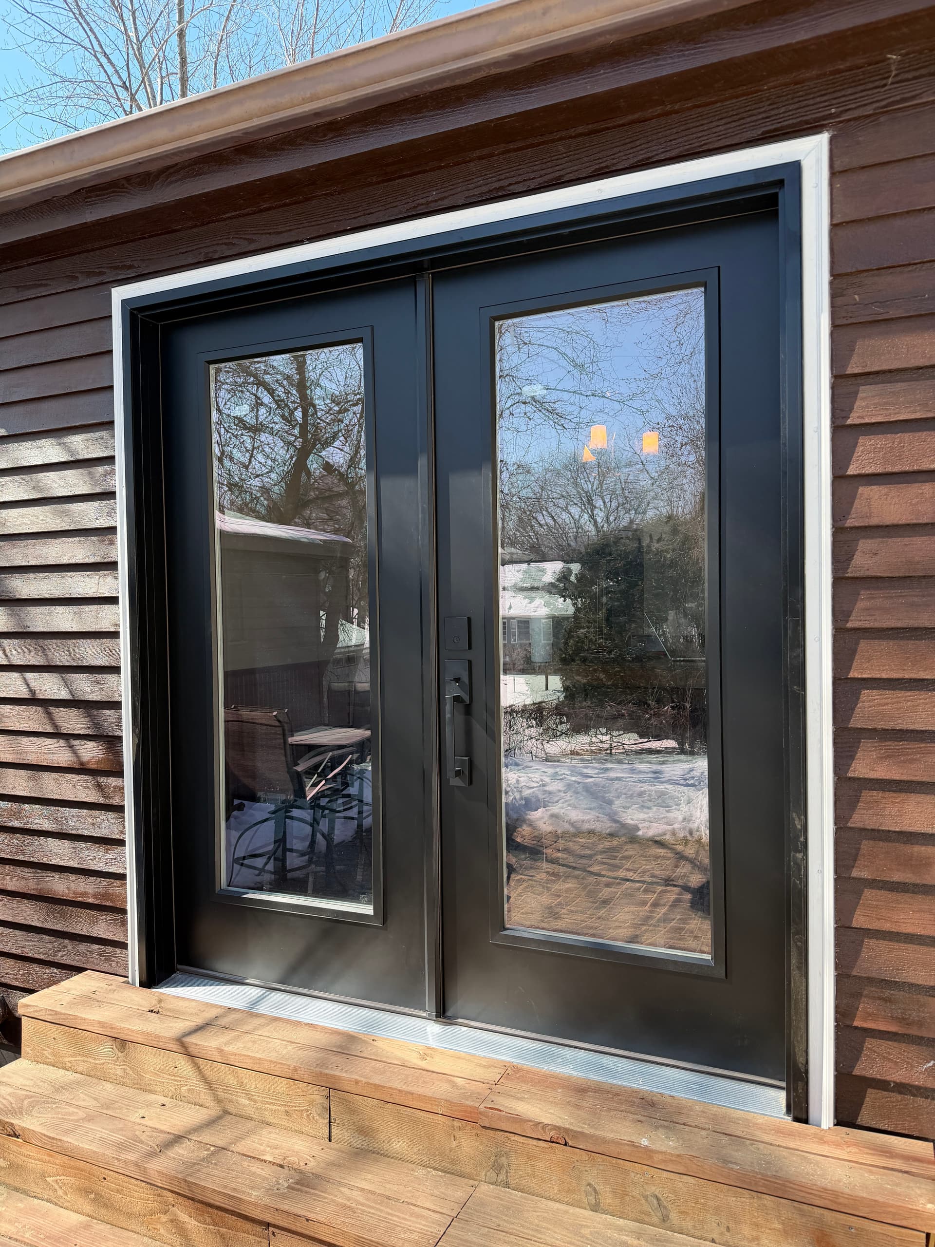 Stylish French Door Upgrade Replaces Old Sliding Glass Door image