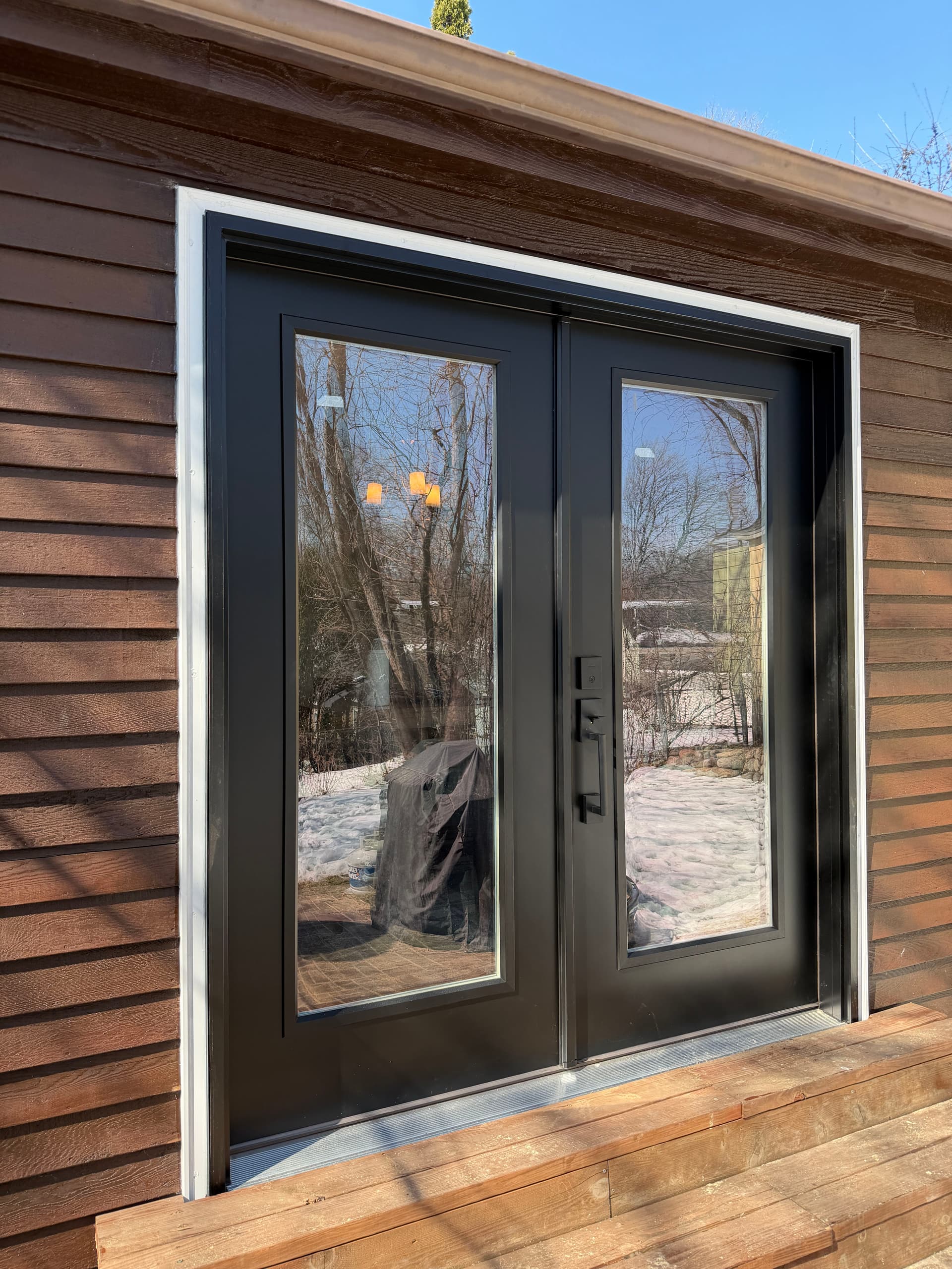 Gallery photos for Stylish French Door Upgrade Replaces Old Sliding Glass Door: Image #1