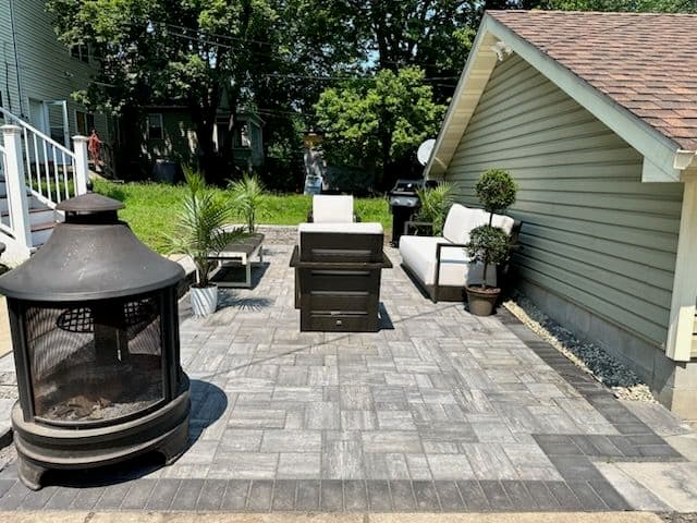 Project Chic Patio with Fireplace by Walker Outdoor Solutions image